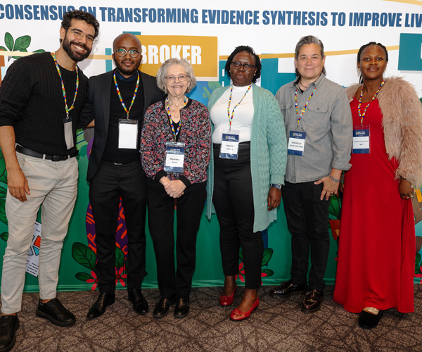 The author Maureen stands with citizen members at the ESIC consensus meeting in Cape Town in June 2025